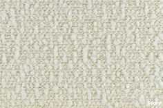 an up close shot of the texture of a white fabric with small dots on it