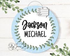 a blue and white plate with leaves on it that says, personalize me michael