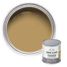 an image of a paint can with a brown tin on the bottom and white base