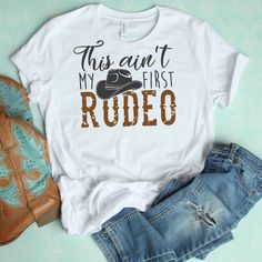 this isn't my first rodeo shirt with cowboy boots on the front and back