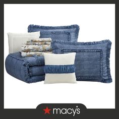 blue denim bedding and pillows with the macy's logo above it on a white background