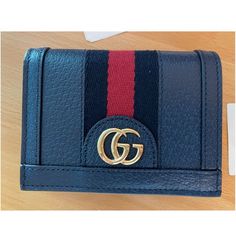 Gucci Ophidia Blue Card Case Gg Foldover Snap Wallet Italy Leather New Gucci Ladies Card Case. Ophidia Series. 523155 Dj2dg 4178 U Card Case (655) Ophidia Dollar Pigprint T/Ns Gucci Blu Agata/Brb 809121920 - 5 Blue Leather Gold Hardware Iconic Blue And Red Stripe Double G Five Card Slots Inside Open Pocket Snap Button Closure Closed: 4.5"W 3.5"H 1"D Made In Italy. Limited Edition - 100% Authentic, Original, New With Tags, Dust Bag, Ready To Ship. Absolutely Brand New. Stunning Piece Of Art Work. Designer Wallets With Card Slots For Daily Use, Designer Compact Wallets With Card Slots, Designer Compact Wallet With Card Slots, Designer Compact Card Holder With Card Slots, Designer Bifold Card Holder For Daily Use, Gucci Rectangular Wallet With Rfid Blocking, Designer Trifold Wallet With Card Slots, Designer Gucci Wallet With Rfid Blocking, Gucci Luxury Wallet With Rfid Blocking