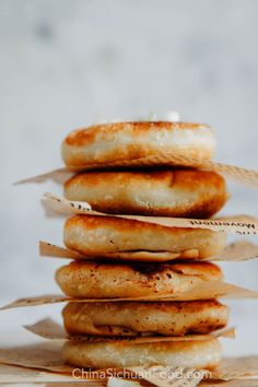 a stack of bagels sitting on top of each other