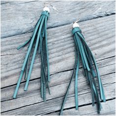 Teal Leather Tassel Earrings With A Pave Ring And Faux Pearl Accent Leather Tassel Earrings, Teal Leather, Pave Ring, Leather Tassel, Tassel Earrings, White Silver, Faux Pearl, Tassels, Color White