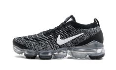 The Nike Air Vapormax Flyknit 3 women's running shoe has fashion-inspired design and advanced footwear technology. The shoe utilizes the Swoosh brand's Flyknit material in black and white to create an "Oreo" effect. Sticking with the simple color palette, solid black covers the toe box, collar, laces, and heel plate. The midfoot Swoosh contrasts in white. A clear translucent Vapormax cushioning unit keeps a spring in your step with toe-to-heel cushioning. | W Air VaporMax Flyknit 3 Vapormax Nike, Nike Air Vapormax Flyknit 3, Black And White Cookies, Nike Air Vapormax Flyknit, Vapormax Flyknit, Nike Air Shoes, 3 Shoes, Fresh Shoes, Jordan 4 Retro