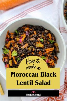 a white bowl filled with black lentil salad next to carrots and celery