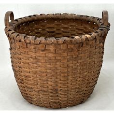 a large woven basket is shown on a white background