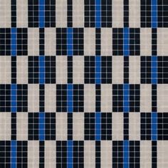 a black and white checkered pattern with blue squares on it's side,