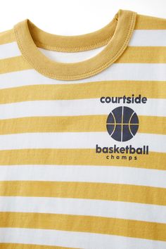 Jonny Short Sleeve TeeCotton On Kids - Jonny Short Sleeve Graphic Print Tee - Corn Silk/White Stripe Basketball ChampsKids | Boys | Clothing | Tops & T-ShirtsKids | Boys | Clothing | Tops & T-ShirtsKids | Boys | Clothing | Tops & T-Shirts Collegiate Striped Tops With Team Name, Striped Collegiate Tops For Game Day, Collegiate Graphic Print Tops For Basketball, Collegiate Striped Tops For Game Day, Summer Sports Tops With Three Stripes, Collegiate Basketball Tops With Graphic Print, Summer Sports Tops With Contrast Stripes, Sports Tops With Contrast Stripes For Sports Season, Summer Sports Top With Contrast Stripes