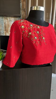 Product Description : Red silk blouse comes with rich detailed and intricate hand works for front and sleeve as shown. Specification: STITCHED BLOUSE: * Material : Silk * Colour : Red*Blouse length :13-14”(Alterable) * Sleeve Length : 11.5" (Alterable)* Style: Patterned as shown * Works : Threads exclusive rich detailed and intricate hand works for neck and sleeve as shown. View this post on Instagram A post shared by threadslabel.com (@shobana_nithin) Festive Raw Silk Blouse With Intricate Embroidery, Fitted Art Silk Embellished Blouse Piece, Designer Silk Blouse With Intricate Embroidery, Party Blouse With Intricate Embroidery In Art Silk, Designer Festive Blouse With Intricate Embroidery, Elegant Embellished Raw Silk Blouse Piece, Designer Red Silk Top, Elegant Embellished Raw Silk Blouse, Formal Silk Choli With Zari Work