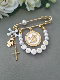 Guardian Angel Baby Pin, Watch Over and Protect Cherub Pin Brooch, Custom Boy Girl Christening Baptism Gifts Keepsake, Pearl Gold Safety Pin Please note! Due to the global pandemic there may be a delay in delivery. Hoping for your understanding and patience. Stay safe and well! This is a beautiful pin brooch handcrafted with Guardian Angel pendant and personalized with initial letter 18k gold plated or silver plated, 6cm long This makes a beautiful and unique gift for a little baby which will be Recuerdos Primera Comunion Ideas, Safety Pin Jewelry, Girl Christening, Angel Baby, Baby Keepsake, Baptism Gifts, Christening Gifts, Baby Angel, Pin Jewelry