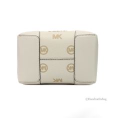 Style: Michael Kors Mercer Small Bucket Drawstring Handbag (Light Cream) Material: Embossed Pebbled Leather Features: Front MK Logo Plate Accent, Drawstring Closure, Adjustable/Detachable Crossbody Strap Measures: 7" H x 7.5" W x 4" D White Travel Shoulder Bag With Embossed Logo, White Shoulder Bag With Embossed Logo For Travel, White Rectangular Shoulder Bag With Embossed Logo, Drawstring Handbag, Michael Kors Mercer, Small Buckets, Michael Kors Crossbody Bag, Mk Logo, Black Pebbles