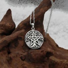 Both necklace chain and Tree Pentacle Pendant are made from pure .925 sterling silver with stamp.  No coatings, no plating, just sterling silver! The pendant on this simple yet beautiful Tree Pentacle Pentagram Necklace measures approximately 1" (2.5 cm) across and has a .925 stamp on the reverse side. Steeped in tradition and symbolism, this heavy Sterling Silver Tree Pentacle Necklace offers a potent talisman for protection and empowerment. For centuries, the pentacle has been a sacred symbol, representing the five elements - earth, air, fire, water, and spirit - and fostering a connection between the wearer and the natural world. This exquisite pendant showcases the pentacle in all its glory, crafted from gleaming sterling silver for a timeless and elegant piece. Unite with the power of Pentacle Necklace, Pentagram Necklace, Pentagram Pendant, Wiccan Jewelry, Sacred Symbols, Silver Tree, Pendant With Chain, Jewelry For Men, Beautiful Tree