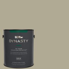 a paint can with the words dynastiy on it in red and black