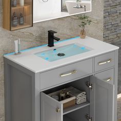 a bathroom vanity with a sink and mirror above it