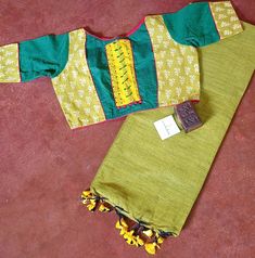 Super saver must try combo for cotton lovers. Solid color dual tone green yellow ,generally we called it "mehendi(Hena) green" color,a very uncommon shade.Purely handwoven ,soft ,pure cotton saree.The saree has been combined with a designer boutique collection blouse. Pure cotton material with hand Kanthastitch and block print mix n match with red lining. The blouse itself is enough to stand up from the crowd. The complete drape will give you a traditional yet smart look for this puja or any oth Saree Bluse, Dhakai Jamdani Saree, Khadi Cotton Saree, Blouse Saree, Jamdani Saree, Designer Boutique, Super Saver, Boutique Collection, Beautiful Saree