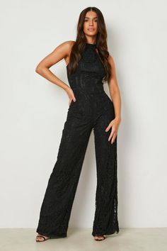 Womens Lace Halter Neck Occasion Jumpsuit - Black - 2 - Sitting pretty at the top of our wishlist this season is this wide leg jumpsuit from our latest collection. Naturally working to balance out your silhouette by creating the illusion of an hourglass figure, this one-piece garment elongates the legs and slims the waistline...winner. Make a statement in a wide leg denim jumpsuit paired with western boots and soft waved hair, or choose a classic black wide leg jumpsuit and prepare to turn heads Black Full-length Jumpsuits And Rompers For Night Out, Night Out Lace Jumpsuits And Rompers With Lace Trim, Elegant Lace V-neck Jumpsuits And Rompers, Elegant Lace Jumpsuit With V-neck, Occasion Jumpsuit, Fitted Lace V-neck Jumpsuits And Rompers, Rip 20s, Black Wide Leg Jumpsuit, Waved Hair