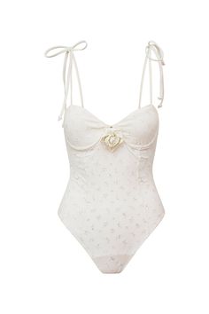 Timeless and sophisticated in the Chamomile One Piece. This must-have one-piece is extra charming, designed with an eyelet fabric and with a floral embossed on the center front. The swimsuit includes underwire for an easy and flattering fit, and self tie thin spaghetti straps. Love Shack Fancy Bathing Suit, Love Shack Fancy Swimwear, Coquette Swimming Suit, Elegant Bathing Suits, Girly Swimwear, Aesthetic One Piece Swimsuit, Coquette Swimsuit, Cute Swimming Suits, Cute One Piece Bathing Suits