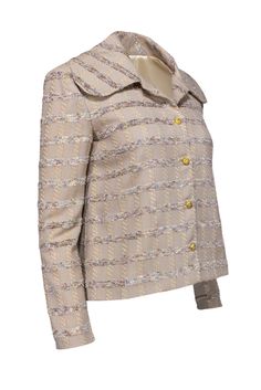 In this jacket from Greta, you’ll be party-ready without even attending a party! Multicolor metallic tweed lines the exterior of the piece, creating a playful and fun atmosphere as soon as you throw it on. The oversized collar adds a unique element, and a beige hue allows versatility within your closet. Size 8 Gold-toned button front closure Lined Oversized collar Long sleeve w/ semi-padded shoulders Multicolor metallic tweed Bust 37” Waist 38” Shoulder to shoulder 16” Shoulder to hem 21” Sleeve Beige Jacket, Collar, Long Sleeve