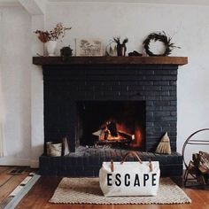 an instagram photo of a fireplace with the caption escape written on it