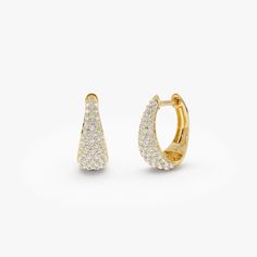 Explore our exquisite Diamond Teardrop Earrings, meticulously fashioned from 14K solid gold featuring 0.95 carats of diamonds. These stylish huggie hoop earrings are perfect for various occasions, blending elegance with versatility. They serve as an ideal gift for commemorating special milestones like anniversaries, adding a touch of luxury to any ensemble. Item Details * Sold As a Pair * Gold Kt: 14K * Custom Gold Color: Rose Gold, Yellow Gold, White Gold * Inner Diameter: 10 MM * Outer Diameter: 13 MM * Width: Starts at 2.5MM and graduates to 6.50MM towards the Bottom * Length: 15.75MM * Round Diamonds: 134 pcs 1 - 1.4 MM * Diamond Color-Clarity: G Color SI1 Clarity * Diamond CTW: 0.95 ctw (pair) * Ready to Ship in 1-2 Business Days ▶ See more of our Diamond Earrings - http://etsy.me/2ly Luxury Hoop Earrings For Anniversary With May Birthstone, Classic White Gold Drop Hoop Earrings, Yellow Gold Drop Hoop Earrings For Anniversary, Anniversary Yellow Gold Drop Hoop Earrings, White Gold Teardrop Huggie Earrings For Anniversary, Fine Jewelry Drop Hoop Earrings For Anniversary, Drop Single Cut Diamond Earrings, Fine Jewelry Teardrop Huggie Earrings With Diamond Accents, Fine Jewelry Teardrop Huggie Earrings For Anniversary