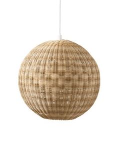 a rattan ball light hanging from a white ceiling with a cord in the middle