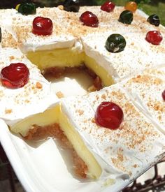 a cake that has been cut into pieces and is sitting on top of a table