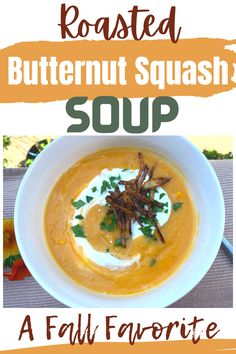 a bowl of butternut squash soup on a table with the title roasted butternut squash soup