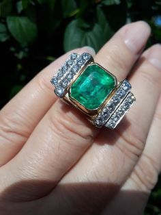 Stunning, Spectacular, Unique, One Of A Kind Ring .. The ring made from 18k Yellow Gold, Approximately 7ct Bright, Green Color, approximately 2ct Diamond ... Antique Box for Display Only .. Very Good Pre Owned Condition. Come with Appraisal $14,000 Luxury Emerald Jewelry For Formal Occasions, Luxury 14k Gold Emerald Ring For Formal Occasions, Exquisite Yellow Gold Emerald Diamond Ring, Heirloom Emerald Diamond Ring For Formal Events, Luxury 14k Gold Emerald Wedding Ring, Exquisite Yellow Gold Emerald Ring, Elegant 14k Gold Gia Certified Emerald Ring, Exquisite Emerald Baguette Cut Ring, Luxury Gold Emerald Ring For Formal Occasions