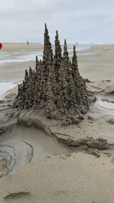 the sand castle is made to look like it's been built on the beach