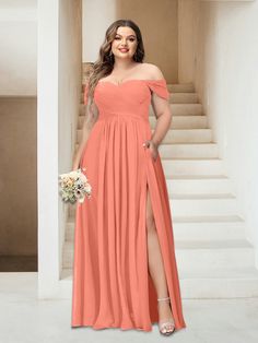 a woman standing in front of stairs wearing an off the shoulder coral colored bridesmaid dress