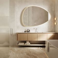 a bathroom with a sink, mirror and bathtub in the middle of the room