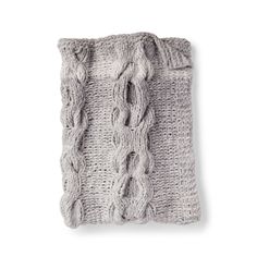 a gray knitted scarf on a white background