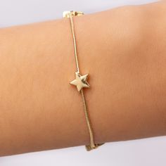 Material: gold plated brass Length: 7" + 1" extension IMPORTED Dainty Star Bracelet, Dainty Adjustable Chain Bracelet With Star Charm, Dainty Gold Chain Bracelet With Adjustable Length, Adjustable Gold Chain Bracelet With Star Charm, Adjustable Chain Bracelet With Star Charm As Gift, Adjustable Gold Charm Bracelet Tarnish Resistant, Adjustable Metal Bracelet With Star Charm, Adjustable Star Shaped Metal Bracelets, Adjustable Metal Charm Bracelet With Star Charm