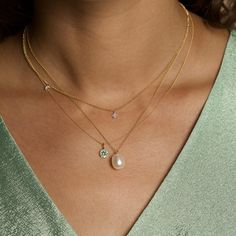 We’re picky about our pearls. Our collection of modern-feel pearl pieces takes your grandmother's favorites and incorporates them into the latest trends, interpreted from our NYC-gal perspective. These gem-quality pearls are freshwater cultured beauties, set in solid gold that won't tarnish or flake. We may have expensive taste, but crazy mark-ups aren’t really our thing. So we balance the best quality and the best price — enough said. 14k Solid yellow gold 9mm x 7mm Oval-shaped freshwater cultu Classic Pendant Birthstone Necklace, Modern Pearl Pendant Jewelry For Wedding, Everyday Luxury Timeless Pearl Jewelry, Modern Jewelry With Pearl Charm, Elegant Oval Necklace With Pearl Charm, Elegant Teardrop Pendant Pearl Necklace, Elegant Teardrop Pearl Necklace For Everyday, Everyday Luxury Pearl Pendant Jewelry, Timeless Gemstone Necklace For May Birthstone