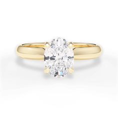 a yellow gold engagement ring with an oval cut diamond