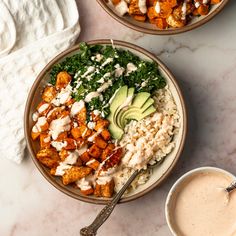 two bowls filled with different types of food