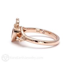 "A symbol of love, friendship and loyalty dating back to the 17th century, the Claddagh ring is a beloved tradition in Ireland. It's been re-created here in this updated contemporary celtic design, with a beautiful natural peachy pink Morganite at the heart. It's available in your choice of 14K or 18K White, Yellow or Rose Gold or Platinum. Made to order. Please allow four to six weeks for delivery. Inquire for the matching wedding band. ABOUT THIS RING Shown on Ring Size 7 Hand Engagement Shank Heirloom 14k Gold Cluster Ring With Bezel Setting, Heirloom Sapphire Ring With Rose Cut Diamonds For Promise, Heirloom Sapphire Ring With Halo In 14k Gold, Heirloom 14k Gold Halo Ring With Rose Cut Diamonds, 14k Rose Gold Rings With Bezel Setting For Anniversary, 14k Rose Gold Rings With Bezel Setting, Heirloom 14k Gold Halo Ring For Anniversary, Heirloom 14k Gold Halo Birthstone Ring, Heirloom 14k Gold Birthstone Halo Ring