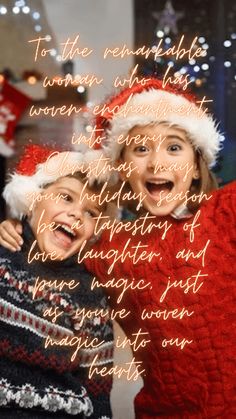 two children wearing christmas hats and sweaters with words written on the side of them