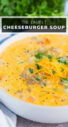 a white bowl filled with cheeseburger soup and garnished with parsley