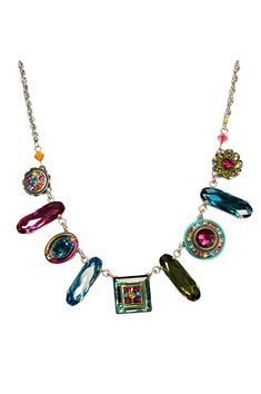 This intricately embellished mosaic jewelry is inset with a combination of Austrian Swarovski crystals and Czech glass beads. Iridescent and colorful. Padparadscha. Oranges, pinks and purples. Lobster style clasps Oxidized silver plate over brass Necklace is 16" Pendant measures 1/2" square with a span of 6" 8299-MC La Dolce Vita Collection Firefly Jewelry specializes in elegant designs, innovative colors mixes and meticulous workmanship. Firefly uses filigree findings made from vintage molds, w Multicolor Crystal Jewelry With Sparkling Stones, Elegant Multicolor Crystal Embellished Jewelry, Multicolor Crystal Beaded Jewelry, Multicolor Beaded Crystal Jewelry, Multicolor Crystal Jewelry With Colorful Beads, Bohemian Multicolor Rhinestone Jewelry, Multicolor Crystal Necklace With Sparkling Stones, Firefly Jewelry, Vintage Molds