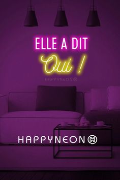 a neon sign that reads,'happy neon'in front of a purple room