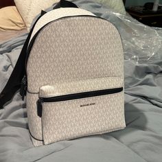 Unisex Backpack - Michael Kors Travel Backpack With Logo, Designer Michael Kors Backpack With Logo, Everyday White Backpack With Logo, White Logo Backpack For Everyday Use, Everyday White Logo Backpack, Classic White Backpack With Adjustable Strap, Classic White Backpack For On-the-go, Luxury Michael Kors White Backpack, Classic White Backpack For Travel