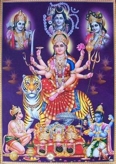 the hindu goddess sitting on top of a tiger, surrounded by other deities and animals