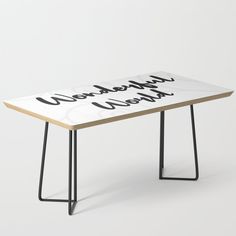 a white table with black writing on it