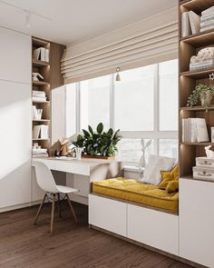 a room with a desk, chair and bookshelf full of books in it