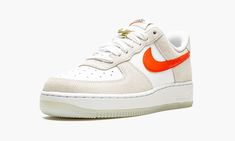 The Women’s Nike Air Force 1 Low SE “First Use” shows respect to the brand’s iconic Swoosh logo with unique, vintage-inspired branding.  A June 2021 release by Nike, this women’s edition of the former basketball shoe references the famous Nike logo with special “First Use June 18, 1971” text below a white outline Swoosh on both sides.  More “1971” detailing also appears on the insoles and a decidedly retro orange “Nike” logo is embroidered onto the heel.  A classic “Nike” insignia with an orange Shoe References, Womens Air Force 1, Nike Air Force 1 Low, Swoosh Logo, Stadium Goods, Air Force 1 Low, Orange Leather, Nike Cortez Sneaker, Nike Air Force 1