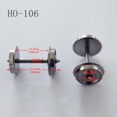 an image of two metal screws with measurements