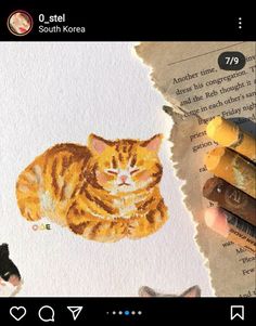 a drawing of a cat laying on top of a piece of paper