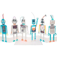 five robot paper sculptures are lined up in a row